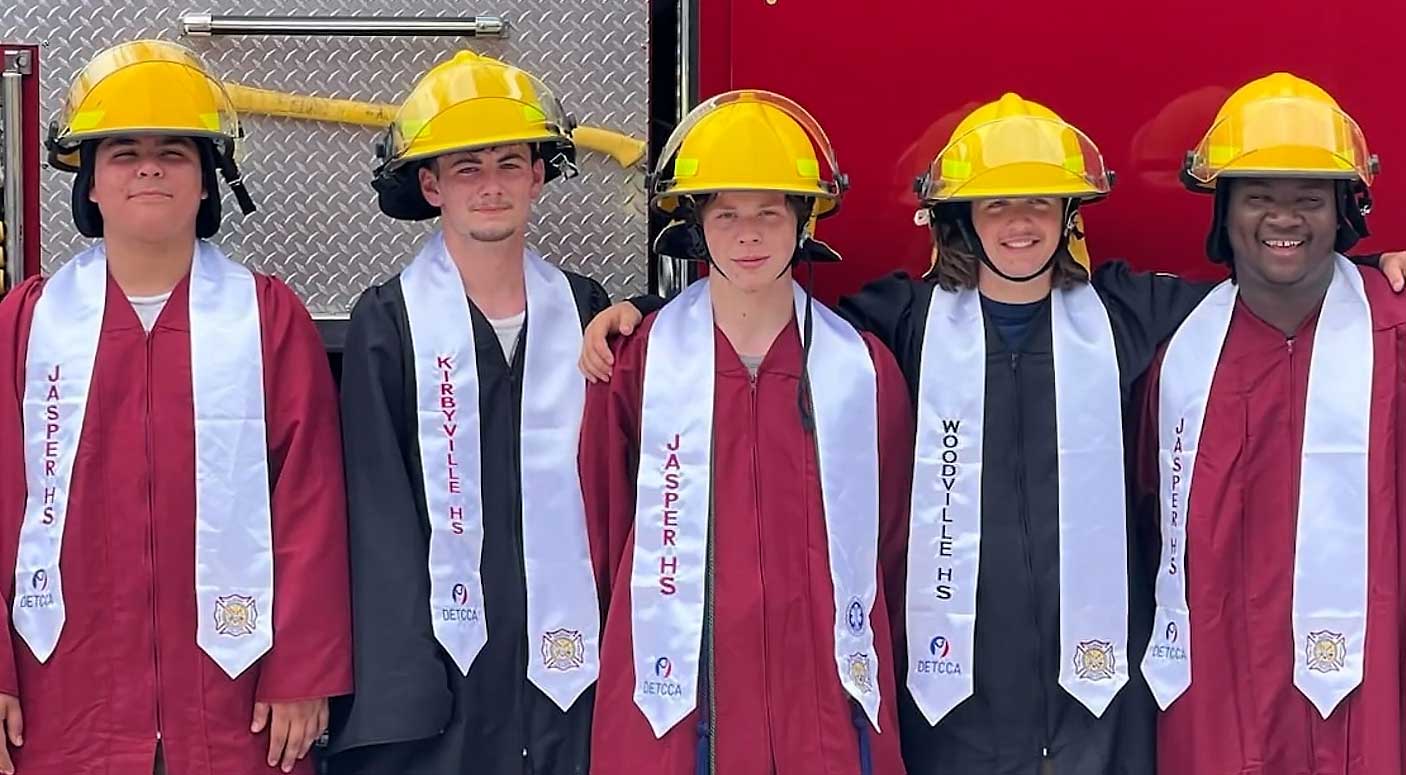 Dual-credit students graduate from the Deep East Texas College and Career Alliance fire academy.